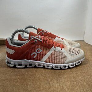 On Running Red and White Athletic Shoes